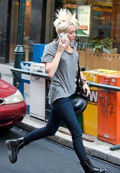 Miley Cyrus Donning Skinny Jeans And Black Doc Martens Boots She Opted