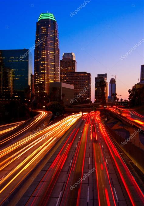 Los Angeles Urban City At Sunset With Freeway Trafic