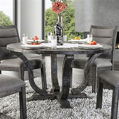 Solid craftsmanship, intricate details and added extras to take your dining room (and entertaining game) to the next level. Isabelle Round Dining Table (Antique Gray) by Furniture of America | FurniturePick
