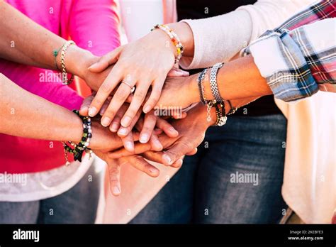 Close Up Of Group Of Hands Holding And Stacking Together In Team Friendship Gesture Concept