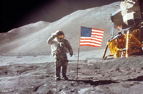 Astronaut David Scott Gives Salute Beside The Us Flag July 30 1971