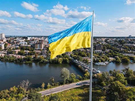 Premium Photo Ukraine Flag On Background Of Panoramic Provincial