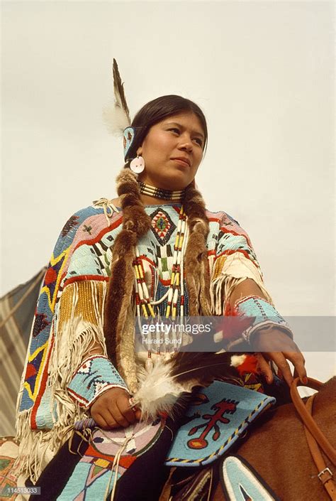 Young Native American Indian Woman On Horseback High Res