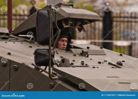 The Driver Of The Combat Vehicle In The Armored Hatch Editorial Photo