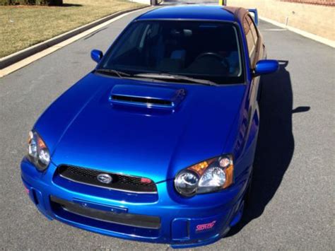 The throwback colour scheme, which was teased over christmas, was made famous by the company's world rally championship programme in the 1990s and 2000s. Buy used 2005 Subaru Impreza WRX STI Sedan. Blue with Gold Rims in Huntersville, North Carolina ...
