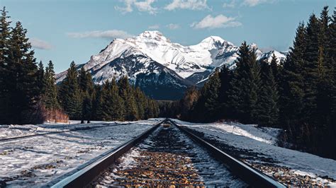 Download Wallpaper 2560x1440 Rails Railroad Mountain Snow Nature