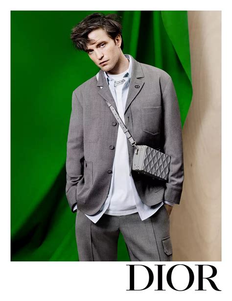 robert pattinson muse of the dior men s spring summer 2023 campaign essential homme