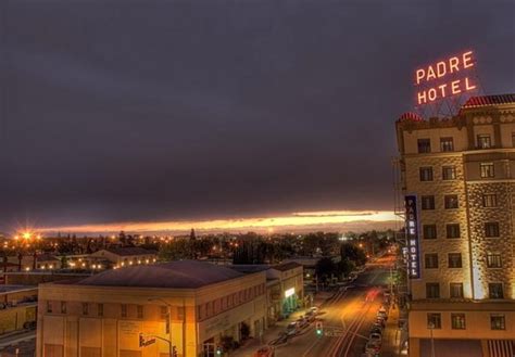 Dusk View Of Bakersfield Catching The Padre Hotel Sign Lit Up Hotel