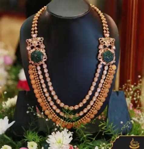 Kasu Mala With Carved Emeralds Jewellery Designs