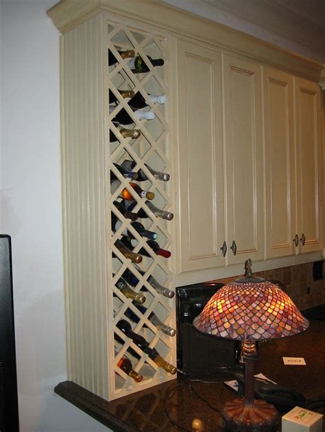 With a few simple steps, your kitchen cabinet nows look like a family minibar! Kitchen wine rack | Kitchen cabinet wine rack, Kitchen ...