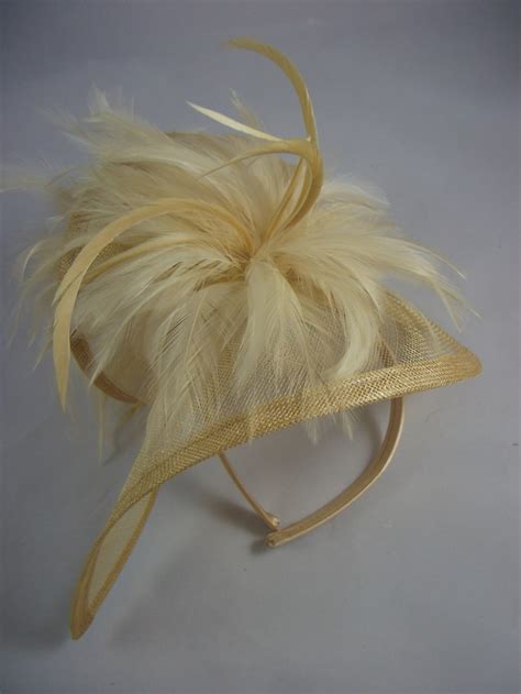 champagne gold sinamay and feathers twist fascinator hat etsy uk
