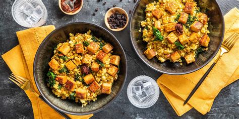 Steam the cauliflower in just enough water to coat the bottom of a pan. Spiced Cauliflower Couscous with Crispy Tempeh & Currants