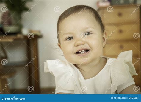 Cute Little Baby Girl Smiling Stock Photo Image Of Home Teething