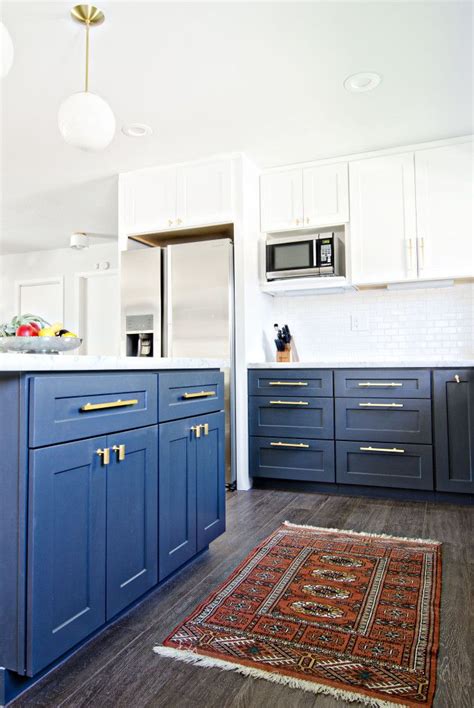 Modern design is streamlined, sure, but that doesn't mean there isn't room for experimentation and bold choices. Navy Gold & White Kitchen Reveal | Kitchen cabinets decor ...
