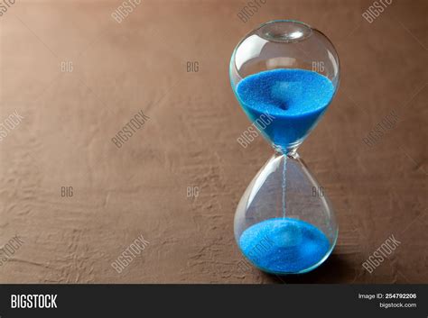 Hourglass Blue Sand On Image And Photo Free Trial Bigstock