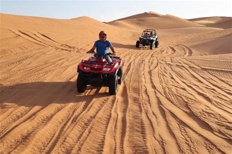 Dubai Quad And Atv Bike Red Dune Desert And Safari Adventure Getyourguide