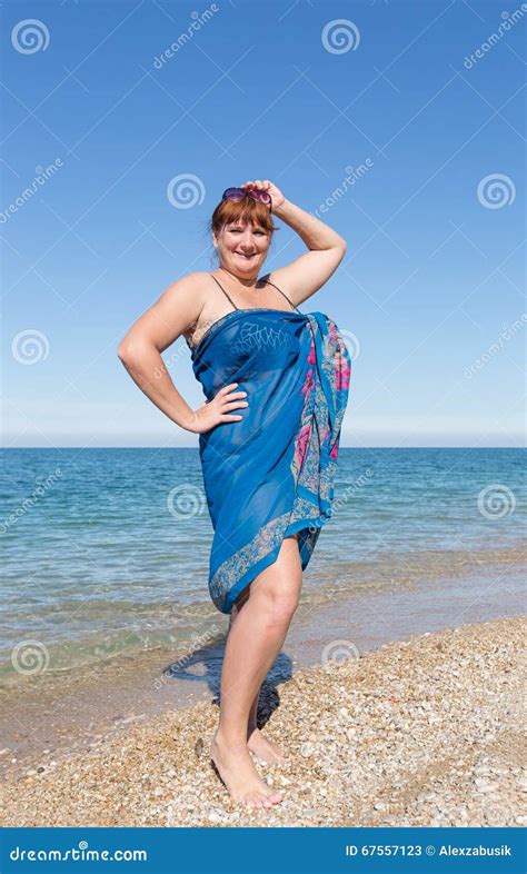 Overweight Middle Aged Woman At The Sea Stock Image Image Of Middle Barefoot 67557123