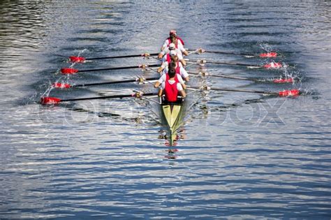 rowers in eight oar rowing boats on the stock image colourbox