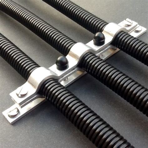 Conduit should be fastened by straps to the ceiling or wall, or supported on hangers from the ceiling at least every 10 feet (figure 11). Conduit Bracket Electrical Cable Conduit Support 15mm Diameter