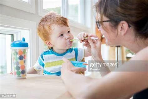 Baby Eat Yogurt Photos And Premium High Res Pictures Getty Images