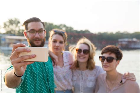 Group Of Young Hipster Friends Make Selfie Photo With Smartphone