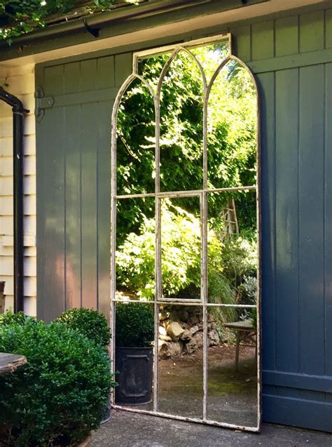 Garden Mirrors Work Perfectly To Reflect The Sunshine Light Into A
