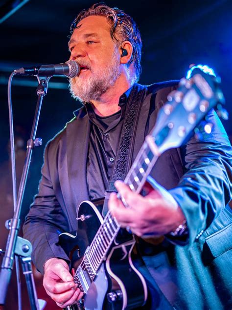 Actor Russell Crowe hits the stage in Melbourne singing with his band ...