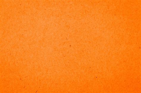 Background Of Orange Paper Texture Premium Photo