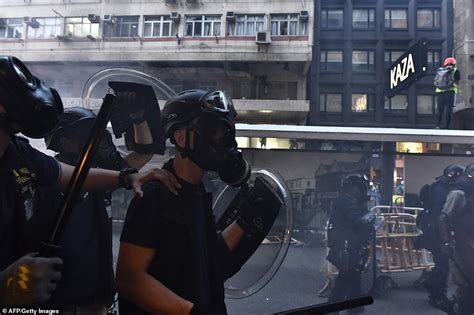 Riot Police Fire Tear Gas At Protesters In Hong Kong On Another Night