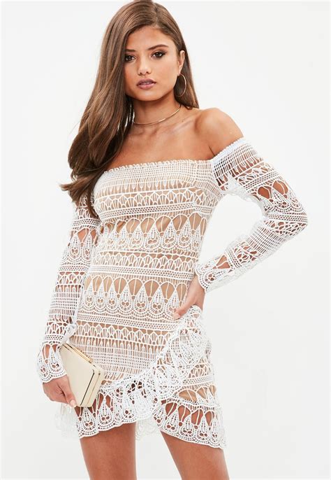 White Lace Bodycon Mini Dress With Beige Under Layer Long Sleeves And