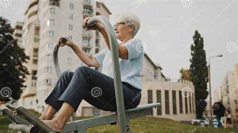 Old Granny Exercising At Outdoors Gym Playground Equipment Stock Image Image Of Female