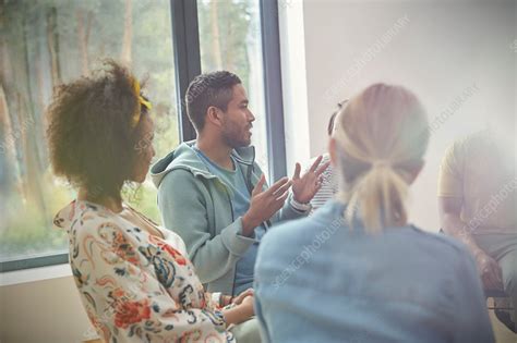 Man Talking And Gesturing In Group Therapy Session Stock Image F020 6586 Science Photo Library