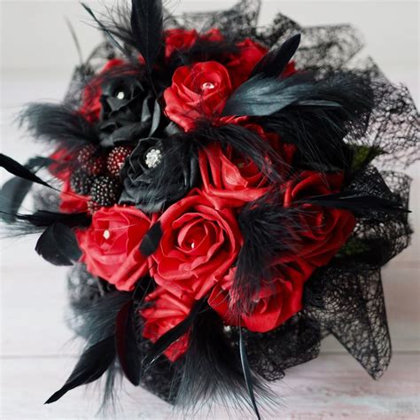See some of our favorite rose wedding bouquets, here. Red & Black Roses Gothic Style hand-Tied Bridal Wedding ...