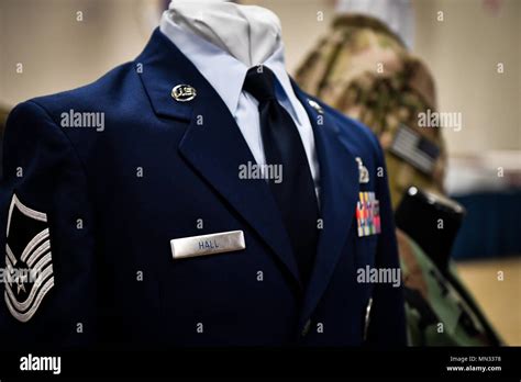 Uniforms From Different Eras Are Displayed With Master Sergeant Stripes