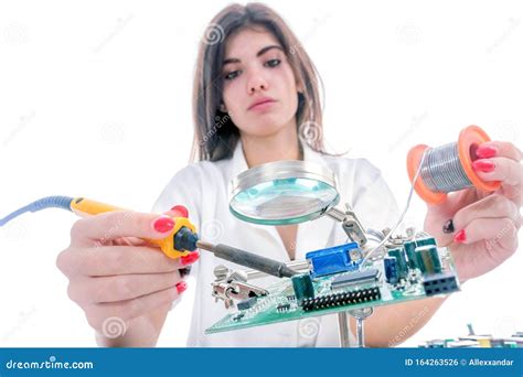 Woman Electronic Technician Repair Electronic Equipment Using Electric