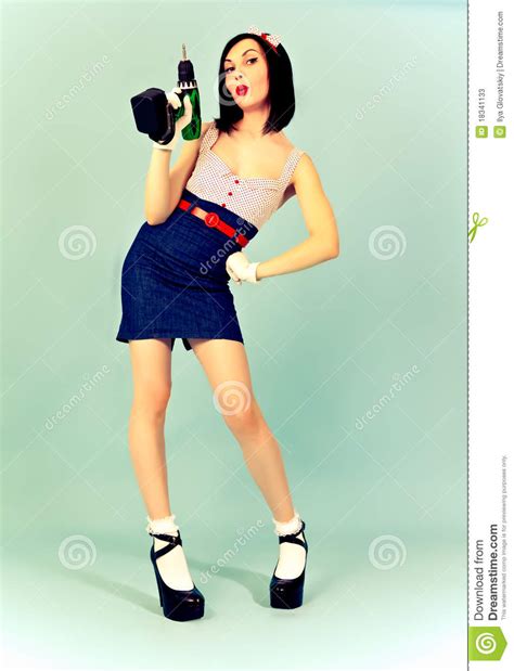 Picture Of Beautiful Pin Up Woman With Tool Stock Image