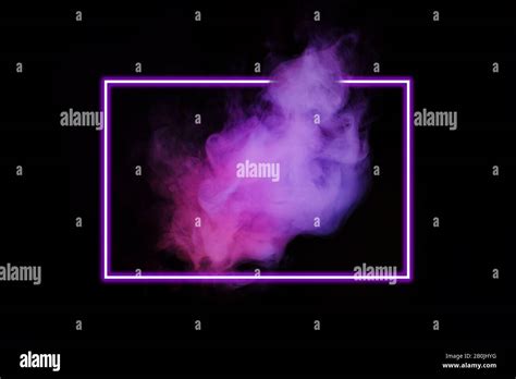 Abstract Neon Light Smoke Effect With Neon Frame On Black Background