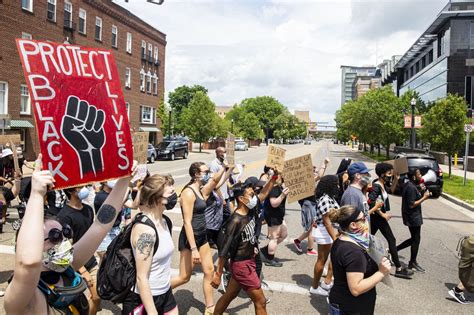 Several Hundred March In Student Led Protest Against Police Brutality