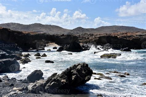 Stunning Seascape Of Black Stone Beach In Aruba 9093625 Stock Photo At