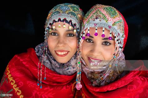 Closeup Portrait Of Two Beautiful Young Moroccan Women Dressed In