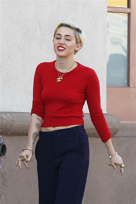 Miley Cyrus Braless Nipple Pokes While Out Shopping