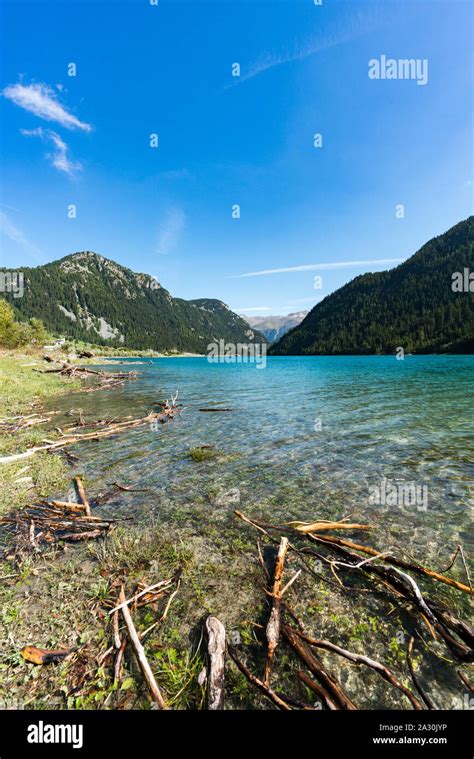 Idyllic And Picturesque Turquoise Mountain Lake Surrounded By Green