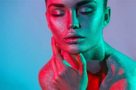 571 High Fashion Model Woman Colorful Bright Neon Lights Posing Studio