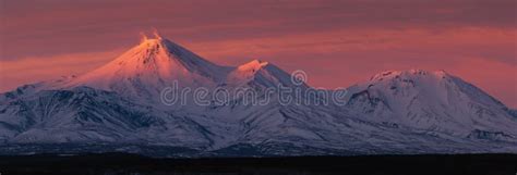 Winter Panorama Landscape Of Volcanoes Of Kamchatka Peninsula At Sunset