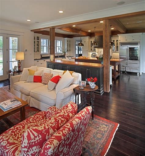 This layout creates an inviting atmosphere and eases learn how to decorate a living room with an open floor plan using our tips on linking different areas, defining zones, and establishing a distinct style. Modern Farmhouse traditional-living-room