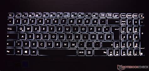 The backlight key on an asus keyboard looks shows a tiny keyboard with glow lines. Asus N752VX-GC131T Notebook Review - TOLATONGTIN
