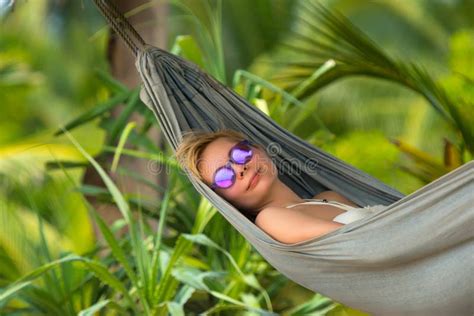 Young Beautiful Woman Relaxing In Hammock In A Tropical Resort Stock Image Image Of Foot