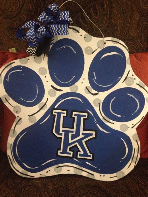 The university of kentucky has fifteen libraries on campus, almost thirty thousand students and, due to its founding in 1865, boasts some beautiful architecture in the city. University of Kentucky Wildcats Door Decor UK Door Hanger ...