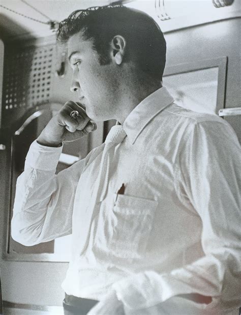 Elvis in the bathroom of the local Southern Railway train July 4, 1956