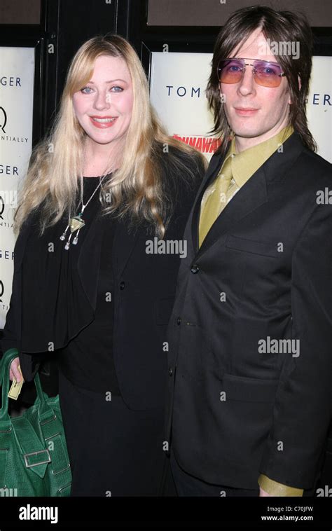 Bebe Buell Jim Wallerstein At The Premiere Of The Runaways Shown At